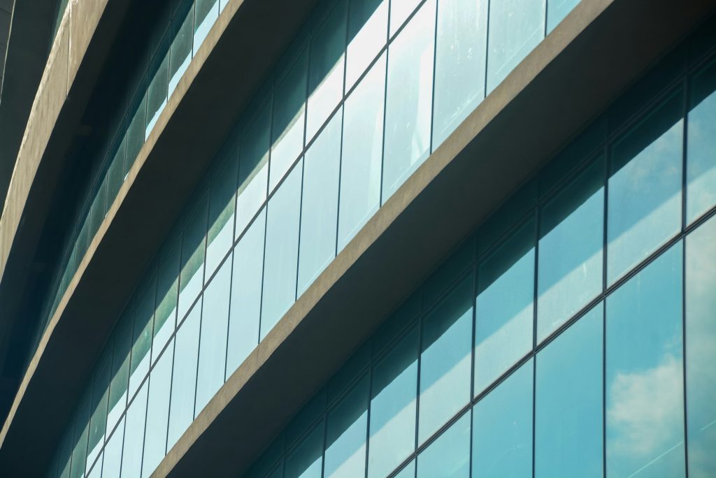 Curtain walling with integrated solar window films
