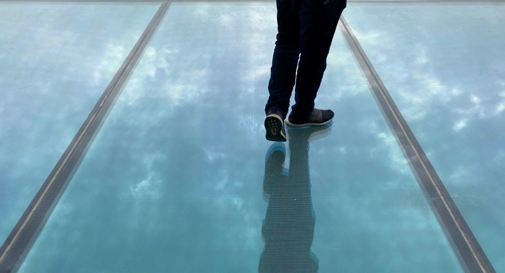Reflection on a glass floor